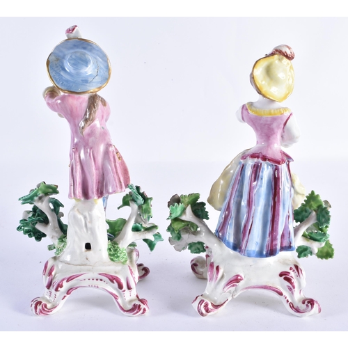 30 - A PAIR OF 18TH CENTURY ENGLISH PORCELAIN FIGURES modelled as a male and female standing beside folia... 