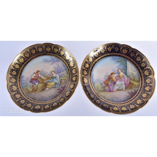 30C - A GOOD LATE 19TH CENTURY FRENCH SEVRES PORCELAIN DESSERT SERVICE painted with figures on a rich blue... 