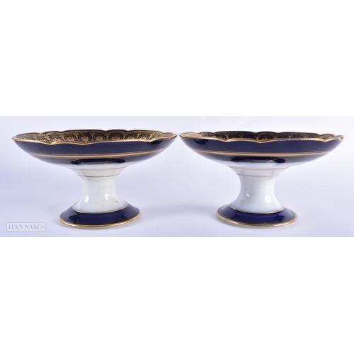 30C - A GOOD LATE 19TH CENTURY FRENCH SEVRES PORCELAIN DESSERT SERVICE painted with figures on a rich blue... 