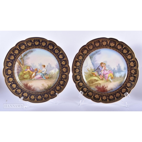 30C - A GOOD LATE 19TH CENTURY FRENCH SEVRES PORCELAIN DESSERT SERVICE painted with figures on a rich blue... 
