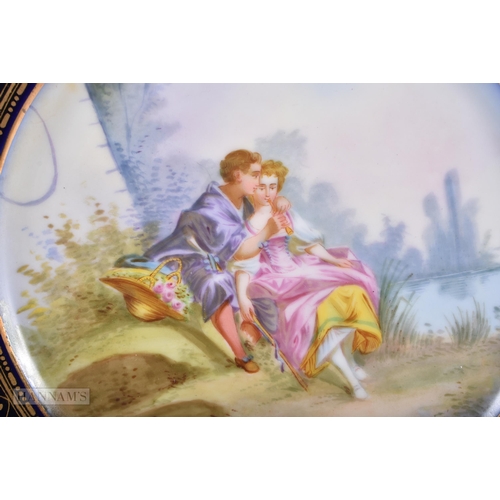 30C - A GOOD LATE 19TH CENTURY FRENCH SEVRES PORCELAIN DESSERT SERVICE painted with figures on a rich blue... 