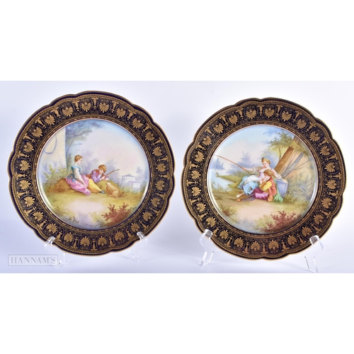 30C - A GOOD LATE 19TH CENTURY FRENCH SEVRES PORCELAIN DESSERT SERVICE painted with figures on a rich blue... 