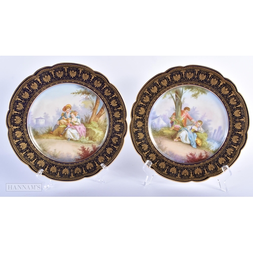 30C - A GOOD LATE 19TH CENTURY FRENCH SEVRES PORCELAIN DESSERT SERVICE painted with figures on a rich blue... 