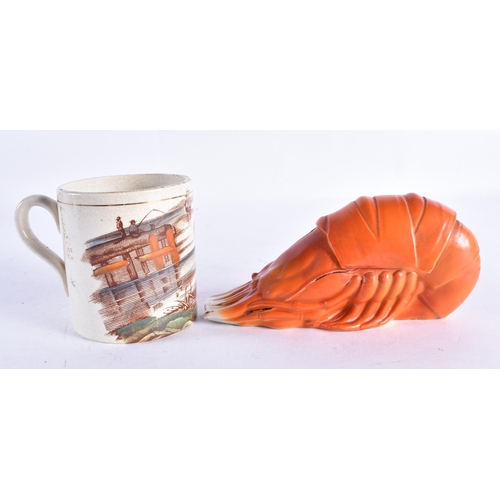 311 - AN UNUSUAL ART DECO CERAMIC LOBSTER BOX AND COVER together with an unusual Victorian rowing mug. Lar... 