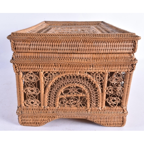 319 - A CHARMING EARLY 20TH CENTURY WICKER CASKET with divided interior. 32 cm x 18 cm x 16 cm.