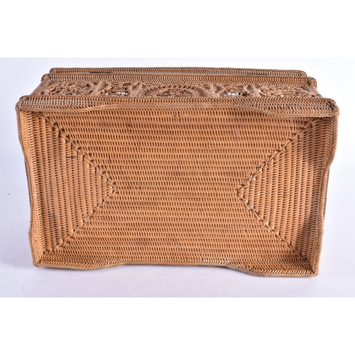 319 - A CHARMING EARLY 20TH CENTURY WICKER CASKET with divided interior. 32 cm x 18 cm x 16 cm.