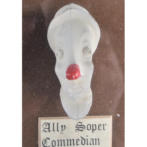 322 - A UNUSUAL ANTIQUE CLAY PIPE DISPLAY. 38 cm x 28 cm.