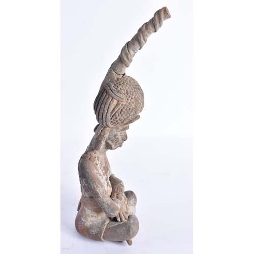 328 - AN UNUSUAL SOUTH AMERICAN TRIBAL POTTERY FIGURE OF A MALE modelled with arms crossed. 22 cm high.