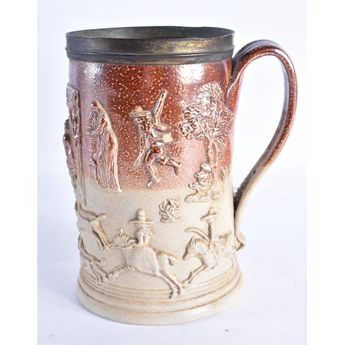 329 - A RARE 18TH CENTURY ENGLISH STONEWARE TANKARD probably Mortlake, depicting a drinking scene, flanked... 