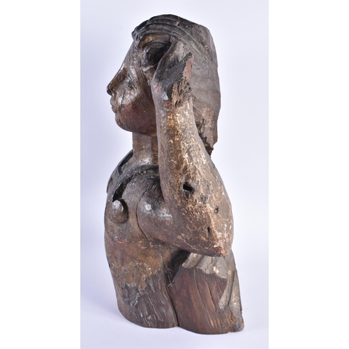 336 - AN 18TH CENTURY EUROPEAN CARVED AND PAINTED WOOD FIGURE possibly a ships figure head. 40 cm x 24 cm.