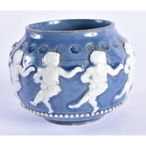 338 - AN UNUSUAL DOULTON LAMBETH DANCING PUTTI BOWL. 9.5 cm wide.