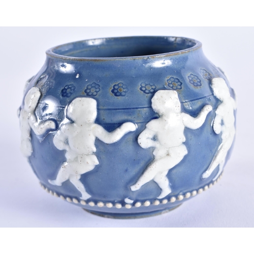 338 - AN UNUSUAL DOULTON LAMBETH DANCING PUTTI BOWL. 9.5 cm wide.