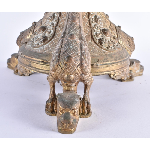 345 - A LARGE 19TH CENTURY CONTINENTAL BRONZE CANDLESTICK decorated with motifs, the feet formed as winged... 