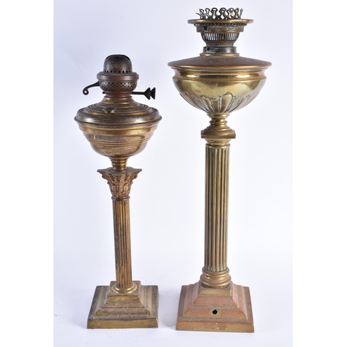 346 - TWO LARGE 19TH CENTURY ENGLISH COUNTRY HOUSE OIL LAMPS formed as corinthian columns. Largest 54 cm h... 