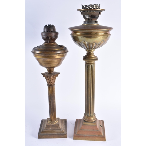 346 - TWO LARGE 19TH CENTURY ENGLISH COUNTRY HOUSE OIL LAMPS formed as corinthian columns. Largest 54 cm h... 