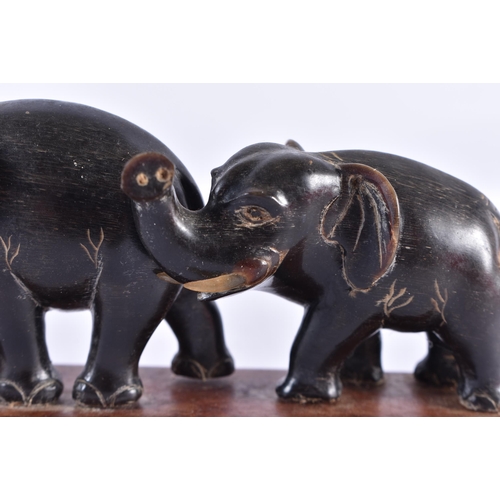 357 - TWO 19TH CENTURY ANGLO INDIAN CARVED RHINOCEROS HORN FIGURES. Largest 11 cm wide. (2)