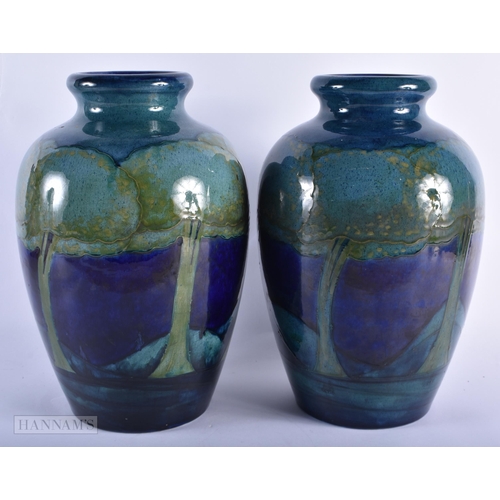 35B - A FINE AND RARE PAIR OF MOORCROFT MOONLIT BLUE VASES C1930 of unusually large scale. 32 x 22 cm  (2)