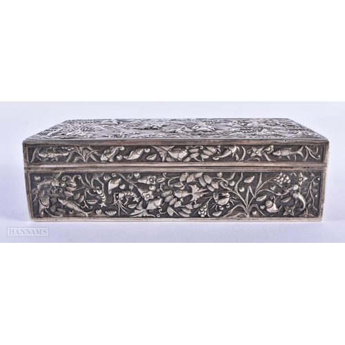 35D - A LARGE 19TH CENTURY CHINESE EXPORT SILVER BOX decorated in relief with figures in various pursuits ... 