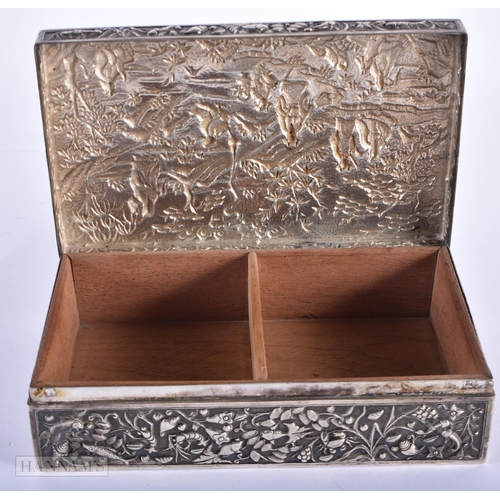 35D - A LARGE 19TH CENTURY CHINESE EXPORT SILVER BOX decorated in relief with figures in various pursuits ... 