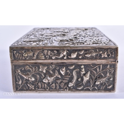 35D - A LARGE 19TH CENTURY CHINESE EXPORT SILVER BOX decorated in relief with figures in various pursuits ... 