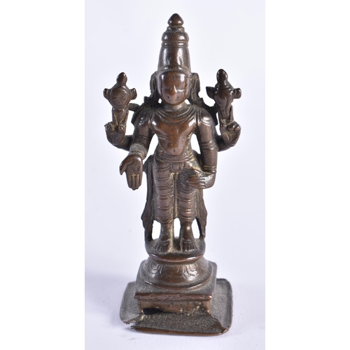 378 - AN 18TH CENTURY INDIAIN BRONZE FIGURE OF A DEITY modelled standing with one hand downturned. 11 cm h... 