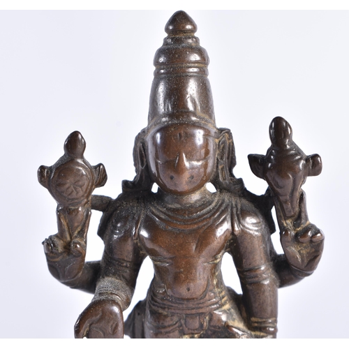 378 - AN 18TH CENTURY INDIAIN BRONZE FIGURE OF A DEITY modelled standing with one hand downturned. 11 cm h... 