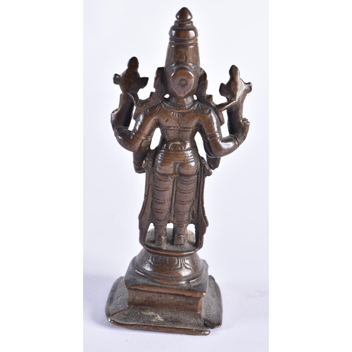 378 - AN 18TH CENTURY INDIAIN BRONZE FIGURE OF A DEITY modelled standing with one hand downturned. 11 cm h... 