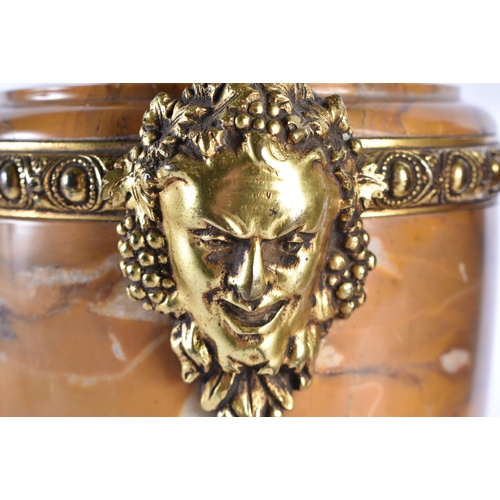 380 - A FINE PAIR OF 19TH CENTURY FRENCH GILT BRONZE SIENNA MARBLE URNS overlaid with bacchus mask heads. ... 