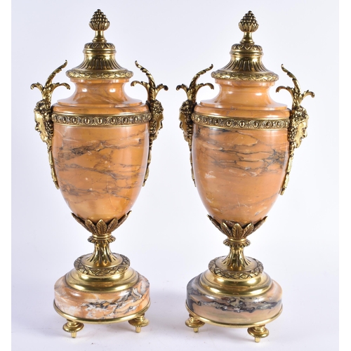 380 - A FINE PAIR OF 19TH CENTURY FRENCH GILT BRONZE SIENNA MARBLE URNS overlaid with bacchus mask heads. ... 