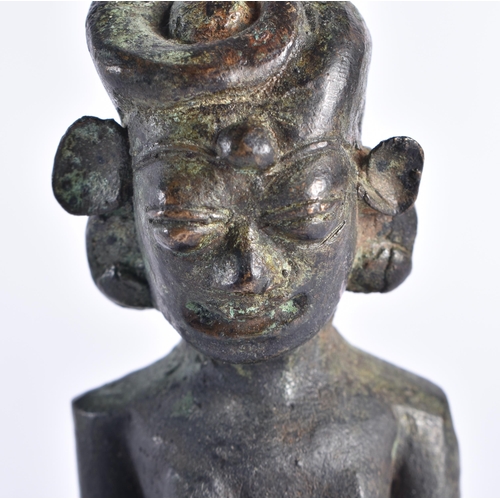 387 - AN UNUSUAL 19TH CENTURY SOUTH EAST ASIAN OR AFRICAN BRONZE BUDDHA modelled as a female with exposed ... 