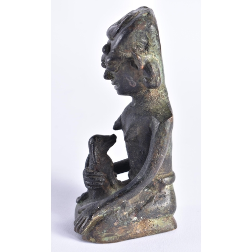 387 - AN UNUSUAL 19TH CENTURY SOUTH EAST ASIAN OR AFRICAN BRONZE BUDDHA modelled as a female with exposed ... 