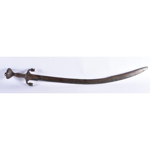 390 - AN 18TH/19TH CENTURY INDO PERSIAN MUGHAL TALWAR SWORD with unusually formed iron handle, the blade w... 