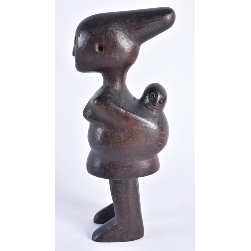 394 - AN UNUSUAL AFRICAN TRIBAL CARVED WOOD FERTILITY FIGURE. 21 cm high.