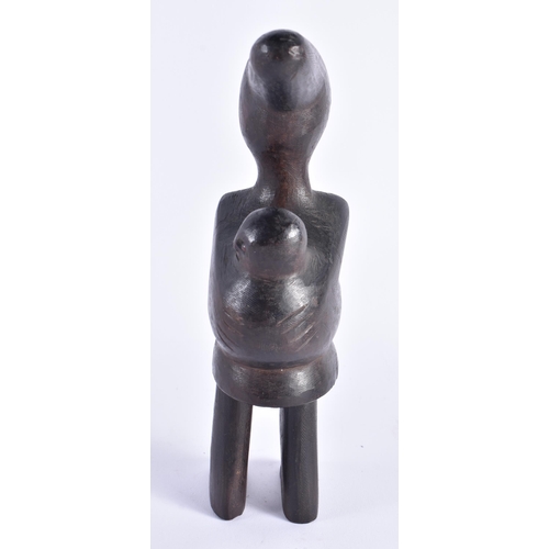 394 - AN UNUSUAL AFRICAN TRIBAL CARVED WOOD FERTILITY FIGURE. 21 cm high.