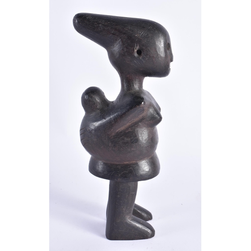 394 - AN UNUSUAL AFRICAN TRIBAL CARVED WOOD FERTILITY FIGURE. 21 cm high.