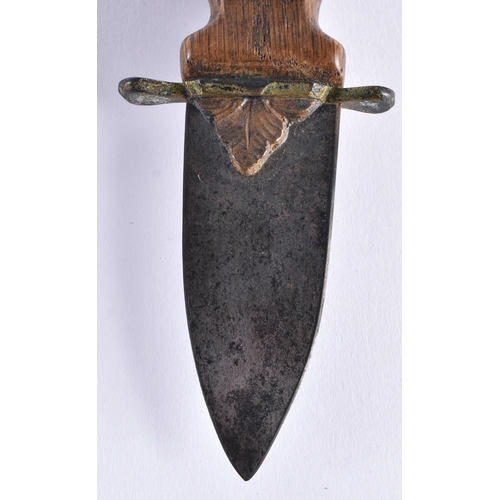 397 - AN UNUSUAL ANTIQUE CARVED WOOD SHORT KNIFE. 17 cm long.