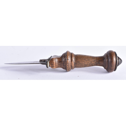 397 - AN UNUSUAL ANTIQUE CARVED WOOD SHORT KNIFE. 17 cm long.