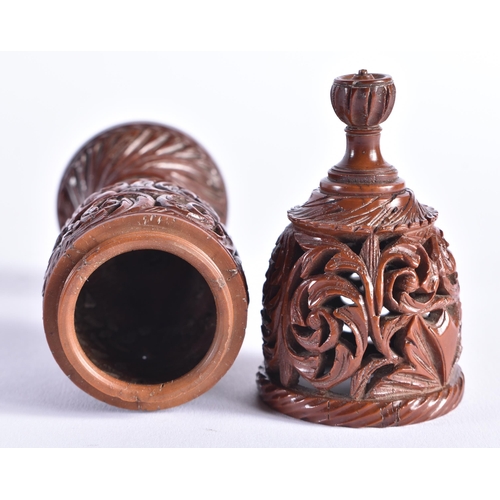 400 - A FINE 19TH CENTURY TREEN CARVED COQUILLA NUT VASE AND COVER possibly a parfumier. 17 cm high.