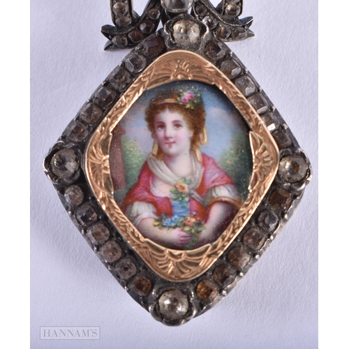 40B - AN ANTIQUE OLD CUT DIAMOND MOUNTED BROOCH with yellow metal surround, painted with a young female. 5... 