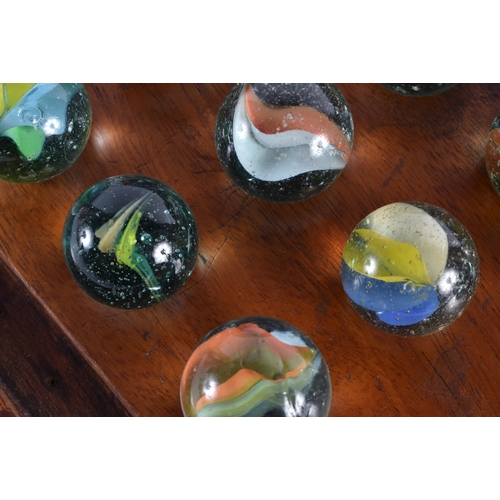 412 - A LARGE ANTIQUE SOLITAIRE MARBLE BOARD with marbles. 29 cm wide, marbles 2.75 cm diameter. (qty)