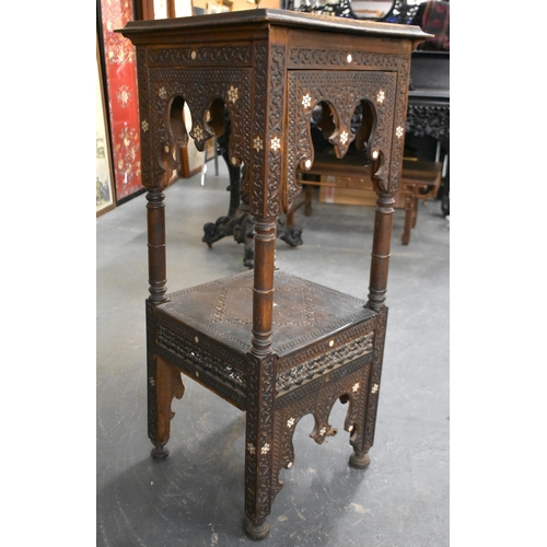 418 - A 19TH CENTURY MIDDLE EASTERN ISLAMIC CARVED WOOD TABLE decorated with calligraphy. 100cm x 45cm x 4... 