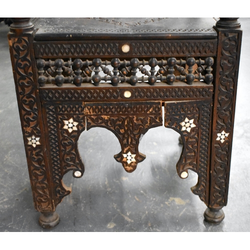 418 - A 19TH CENTURY MIDDLE EASTERN ISLAMIC CARVED WOOD TABLE decorated with calligraphy. 100cm x 45cm x 4... 