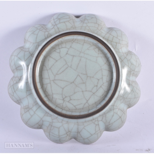 426 - A CHINESE GUAN TYPE PETAL FORM SCALLOPED DISH. 17 cm wide.