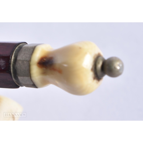 430 - AN ANTIQUE VIOLIN BOW. 70 cm long.