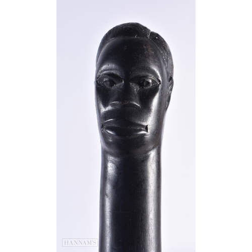 433 - AN AFRICAN TRIBAL EBONY FIGURAL WALKING CANE. 100 cm long.