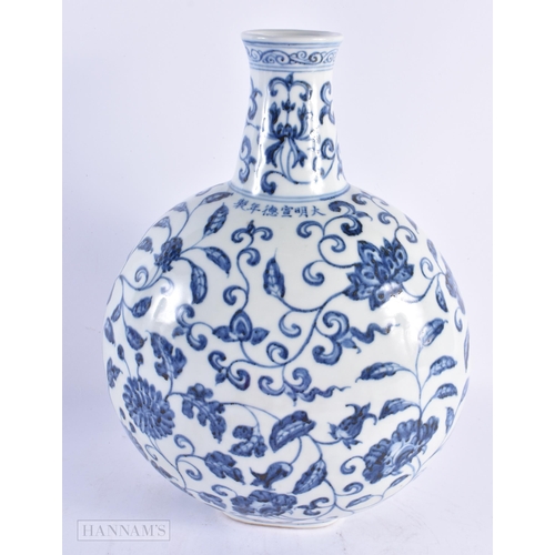 435 - A LARGE CHINESE BLUE AND WHITE PORCELAIN FLASK painted with flowers. 32 cm x 20 cm.