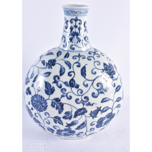 435 - A LARGE CHINESE BLUE AND WHITE PORCELAIN FLASK painted with flowers. 32 cm x 20 cm.