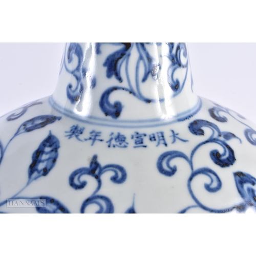 435 - A LARGE CHINESE BLUE AND WHITE PORCELAIN FLASK painted with flowers. 32 cm x 20 cm.