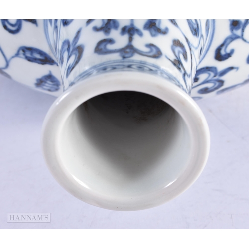 435 - A LARGE CHINESE BLUE AND WHITE PORCELAIN FLASK painted with flowers. 32 cm x 20 cm.