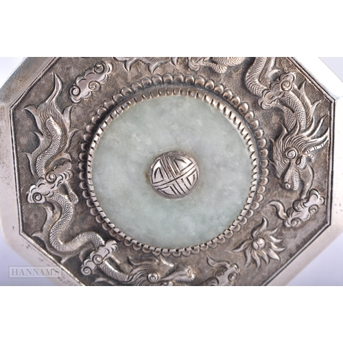 45C - A LATE 19TH CENTURY CHINESE STRAITS SILVER BOX AND COVER inset with a jadeite disc. 8 x 8.5 cm